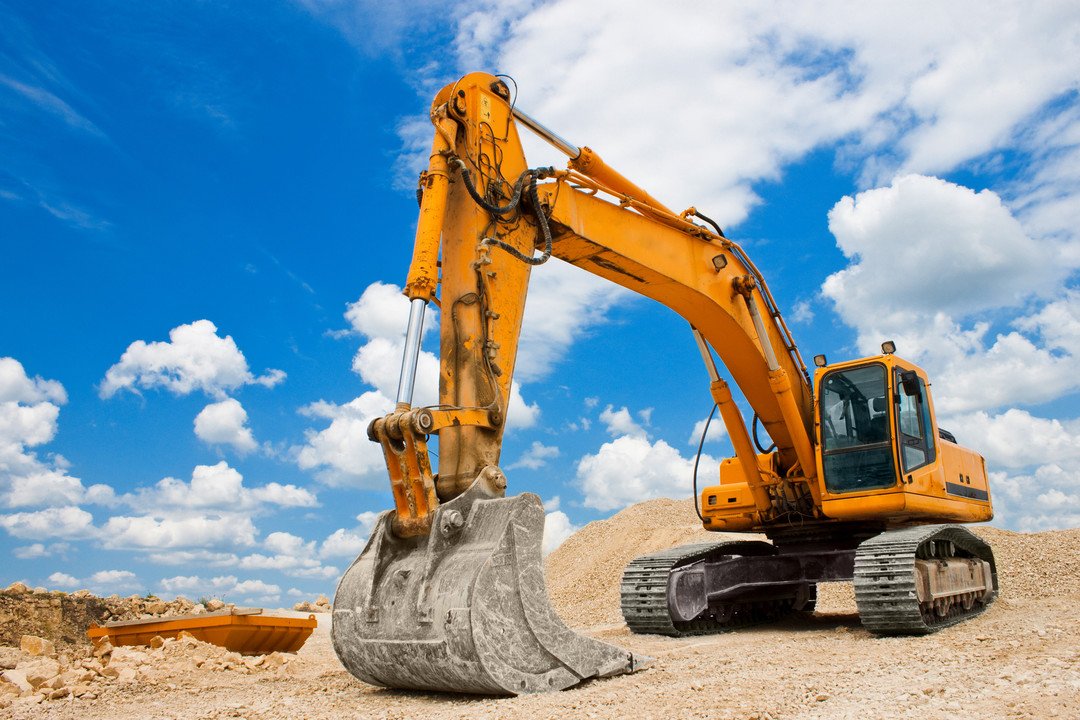 Yellow Excavator at Construction Site